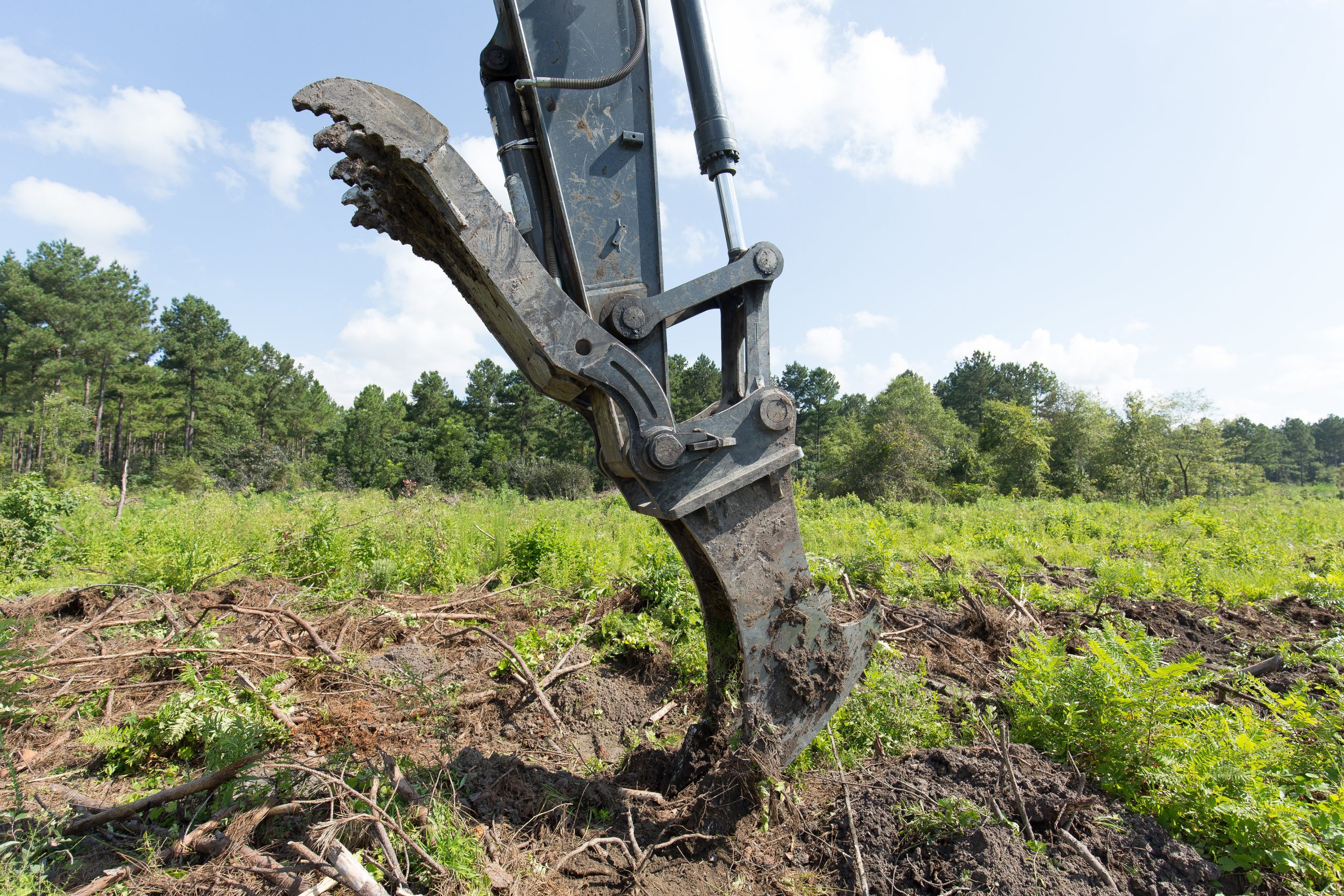 Excavator stump puller